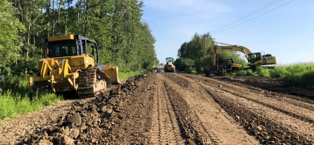 Heavy contruction equipment completing road improvements