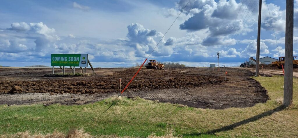 Excavated field with Cervus coming soon sign