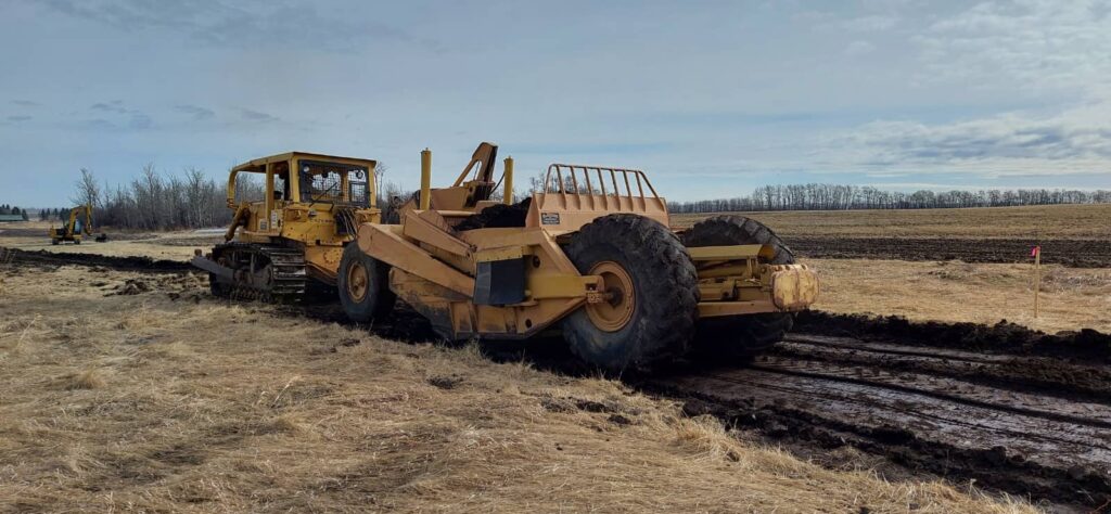 Heavy construction equipment starting excavation